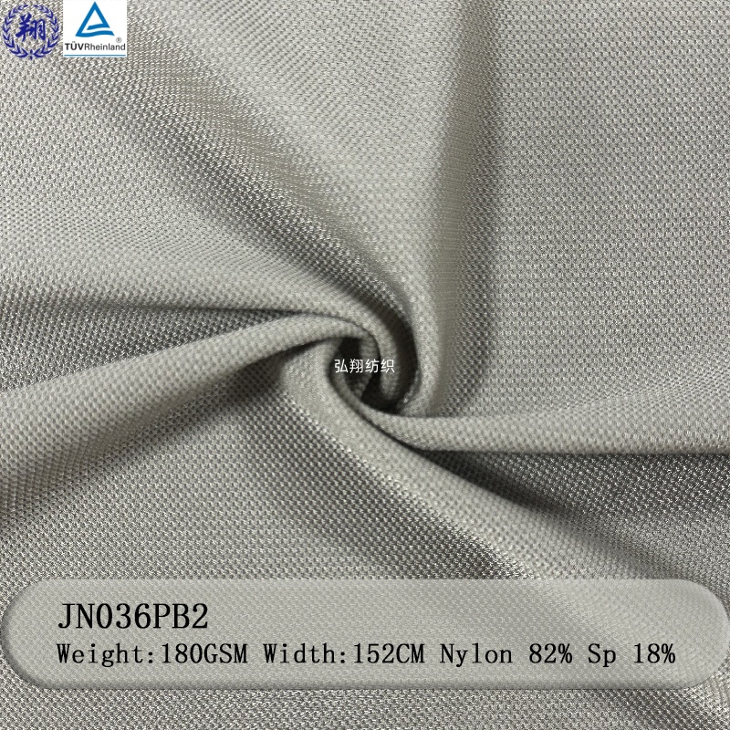 Hot selling Jacquard Fabric 180GSM JN036PB2 82% Nylon 18% Spandex Warp Knitted Fabric  For Sportswear Underwear